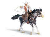 Cowboy with Lassoo on Horse